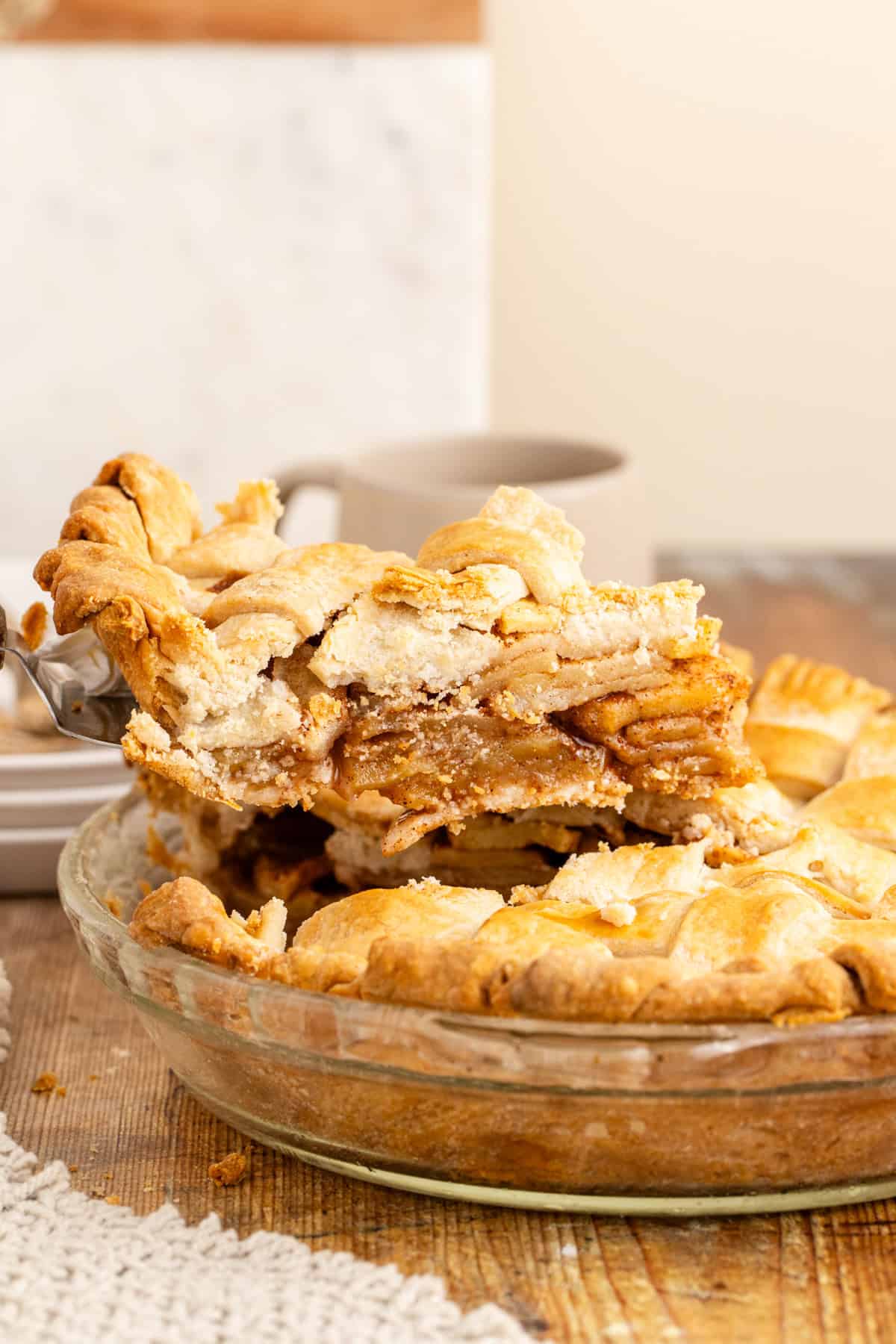 Apple Pie a la Mode Slice being lifted out of whole pie