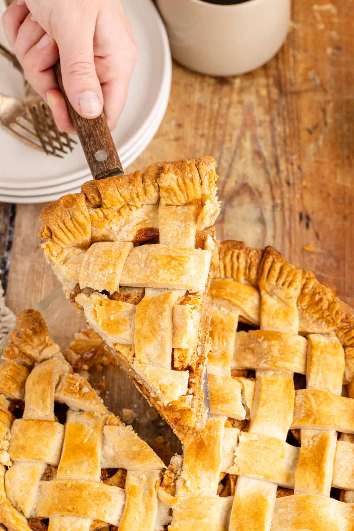 Apple Pie a la Mode Slice being lifted out of whole pie