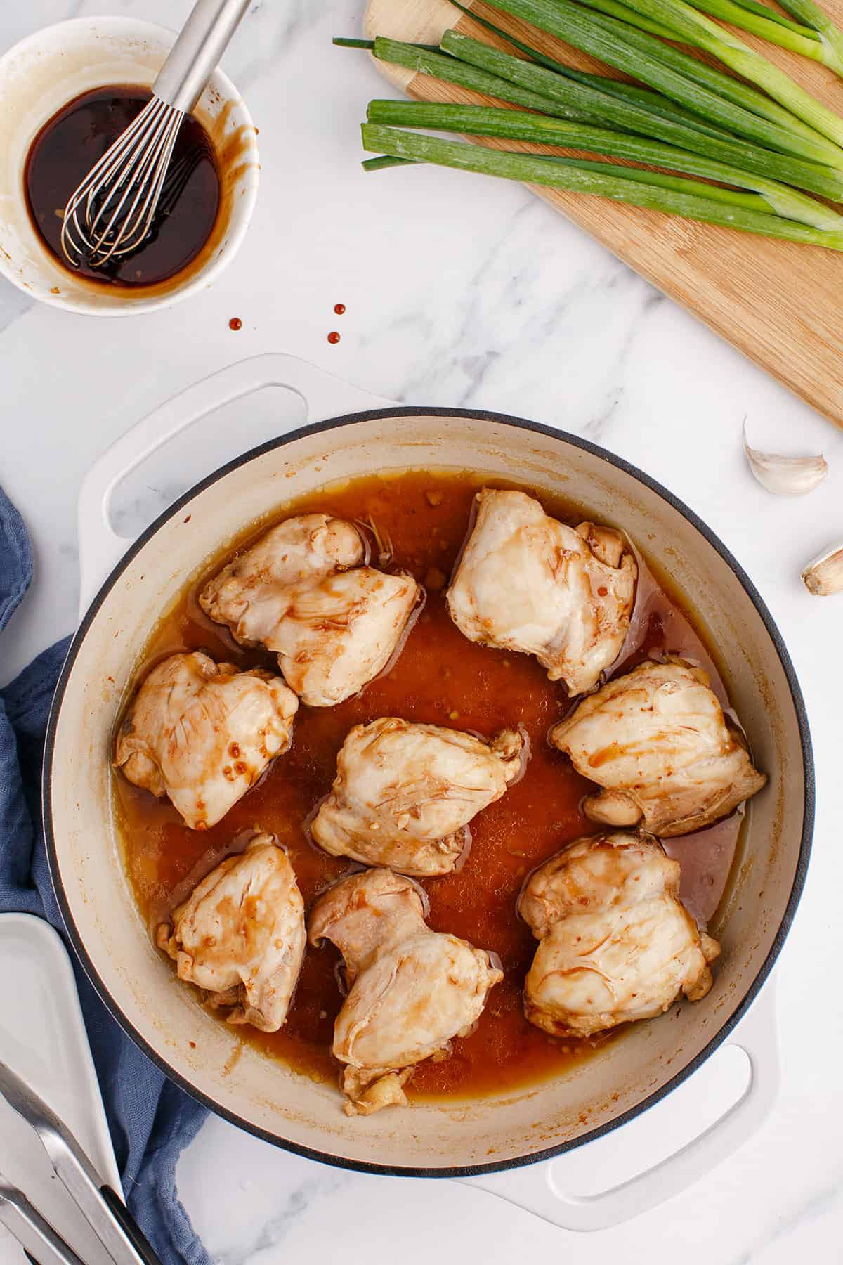 Chicken Thighs with Honey Being Cooked in a Pan