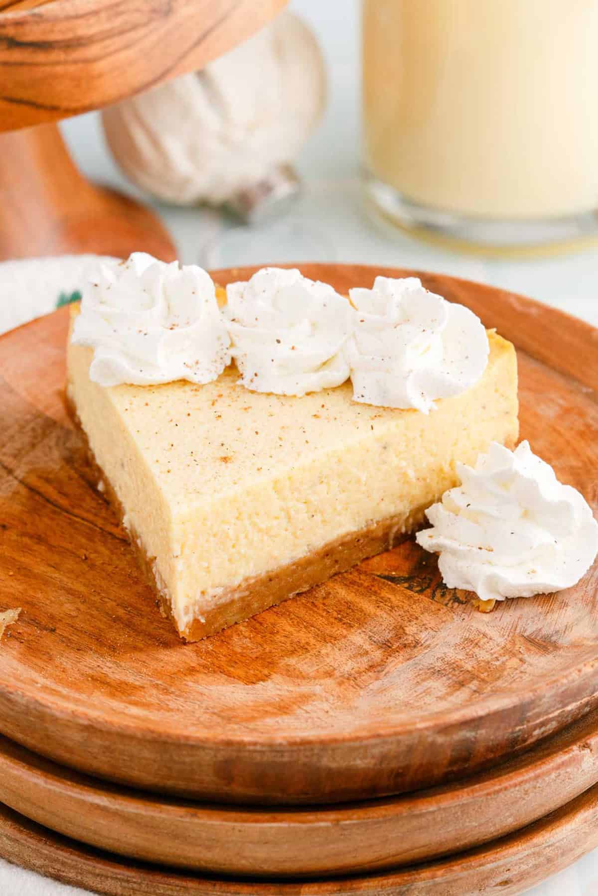 Eggnog Cheesecake Slice With Whipped Cream