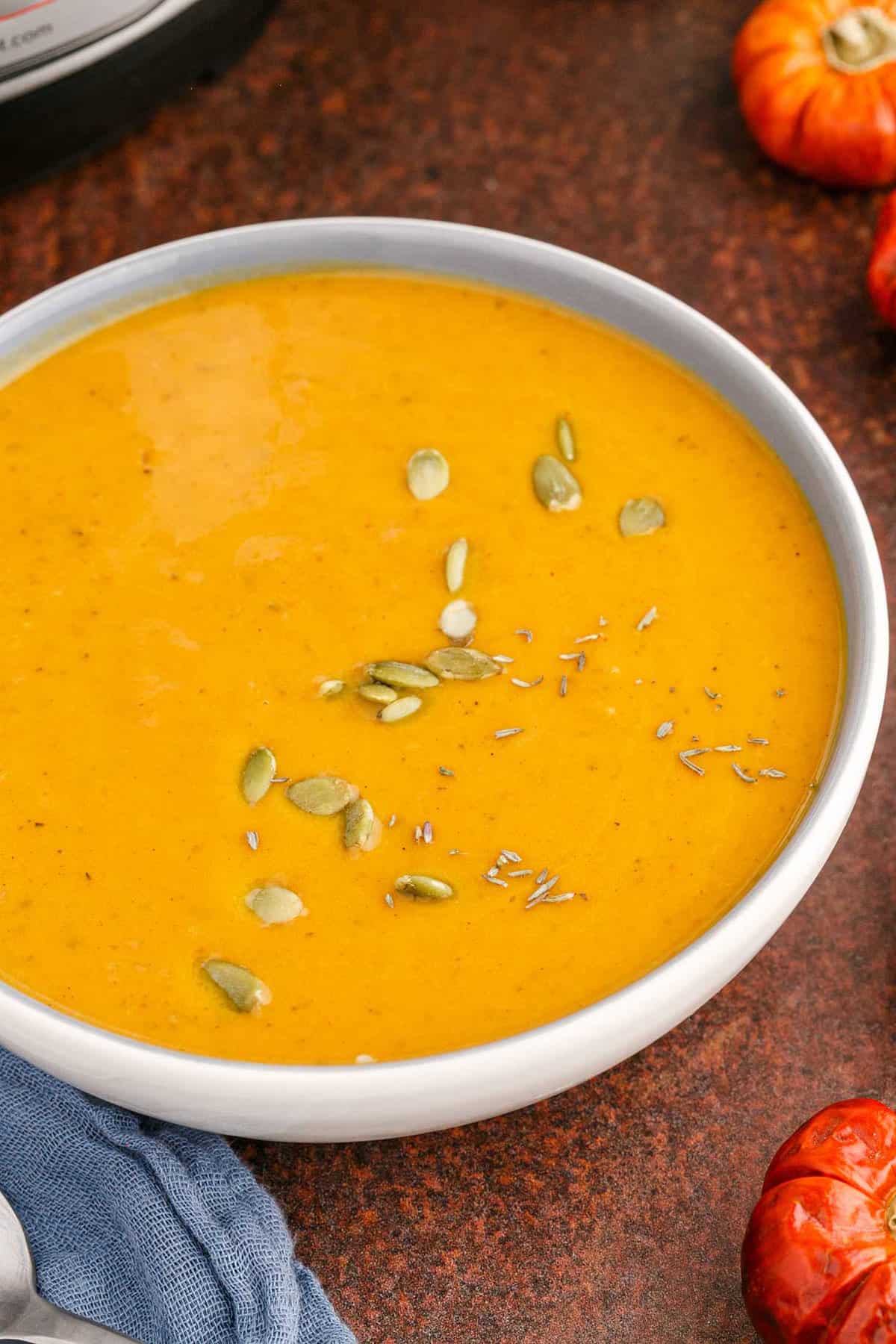 Instant Pot Pumpkin Soup in Bowl with Pumpkin Seeds