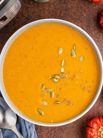 Instant Pot Pumpkin Soup Topped with Pumpkin Seeds