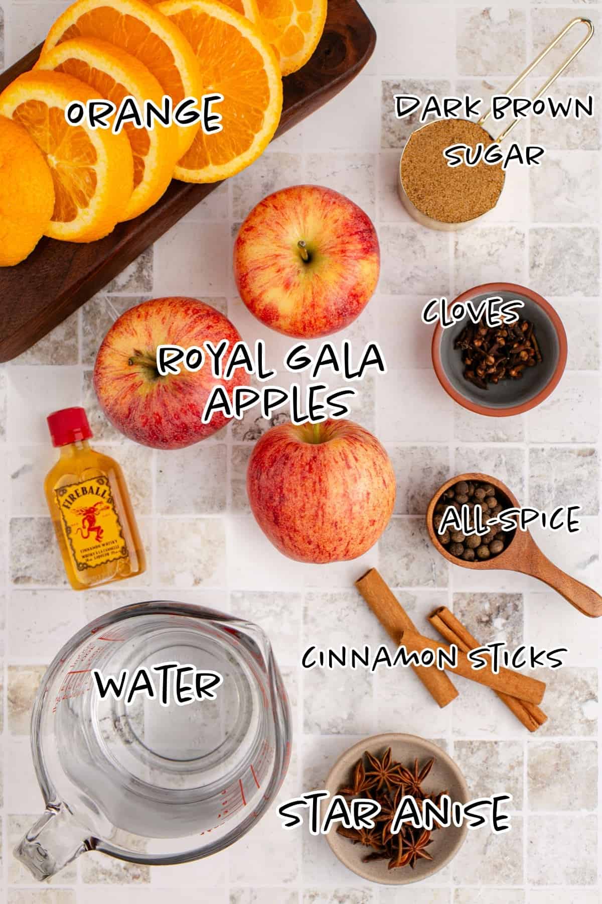 Spiked Apple Cider Crockpot Ingredients on a Countertop