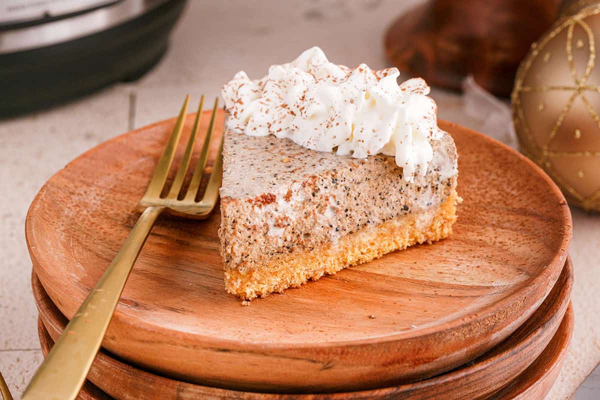 Tiramisu Cheesecake On a Plate With Whipped Cream