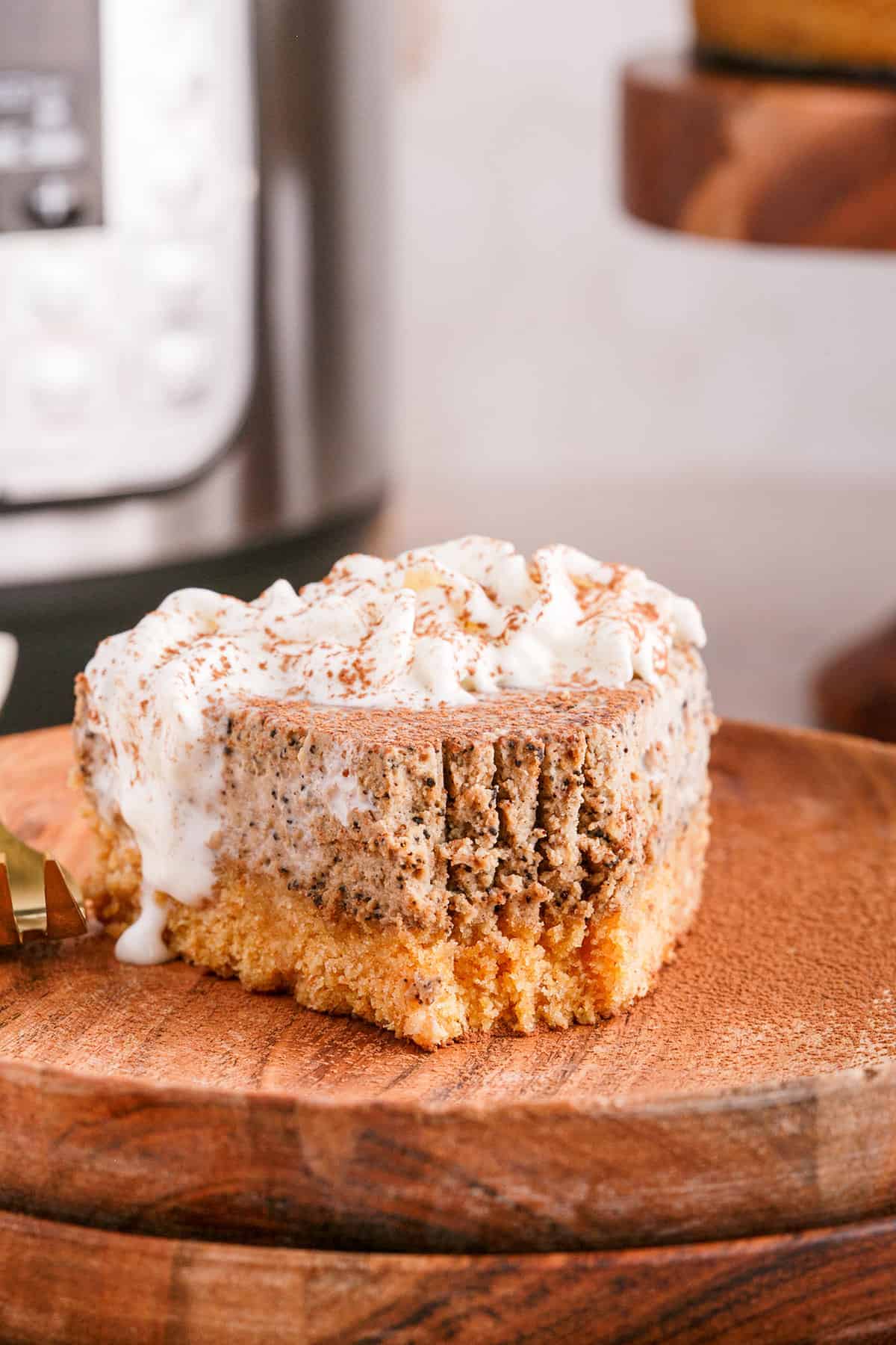 Tiramisu Cheesecake On a Plate With Fork Marks