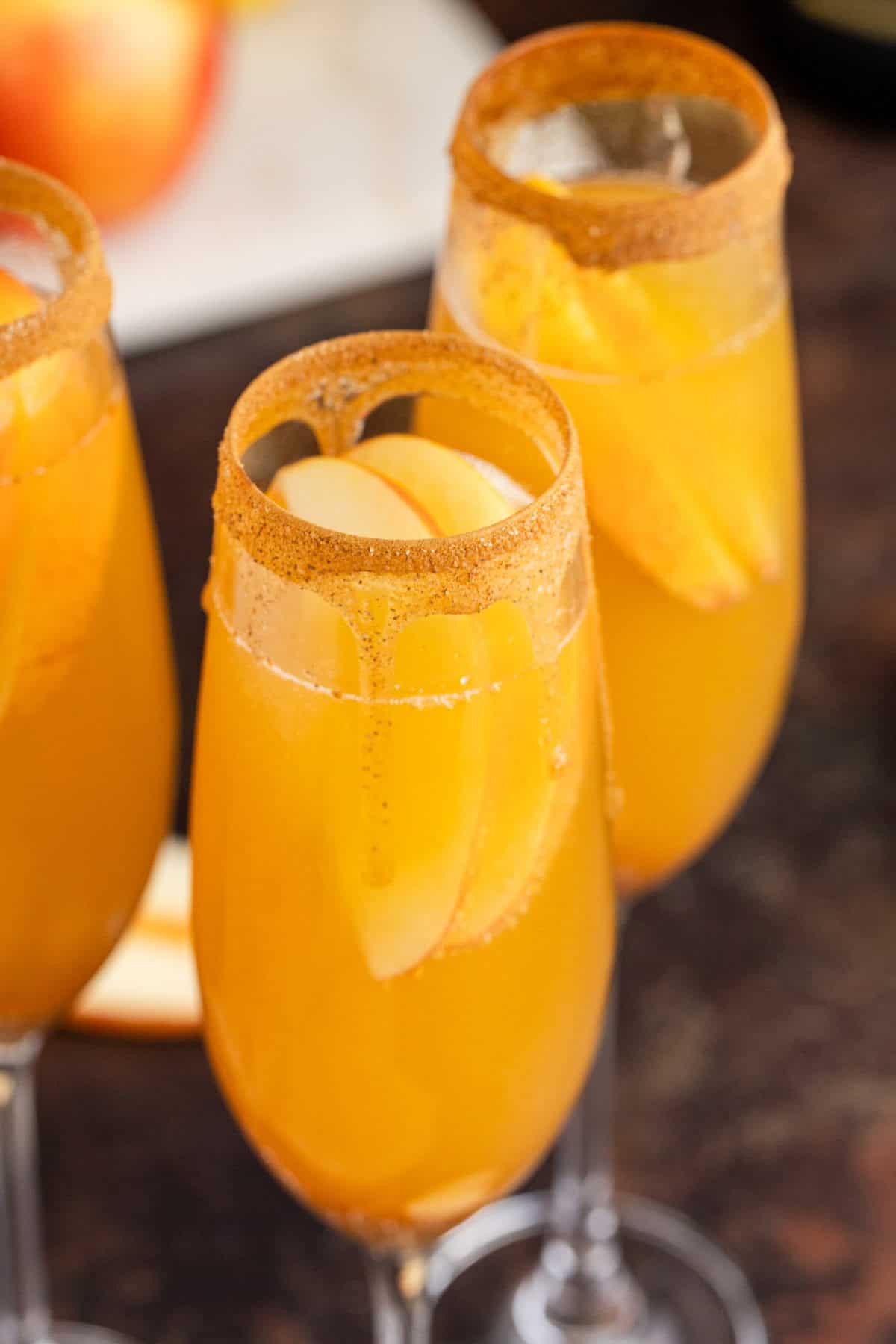 Apple Cider Mimosas in Cinnamon Sugar Rimmed Champagne Flutes