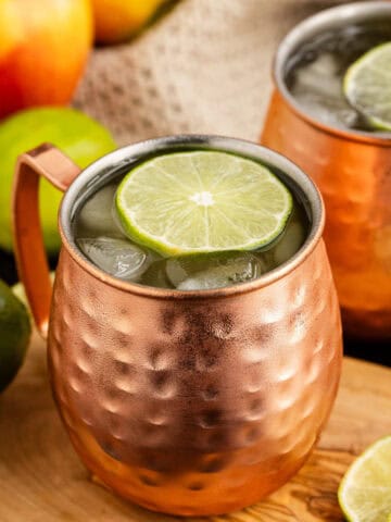 Apple Cider Moscow Mule in Copper Cup with Lime