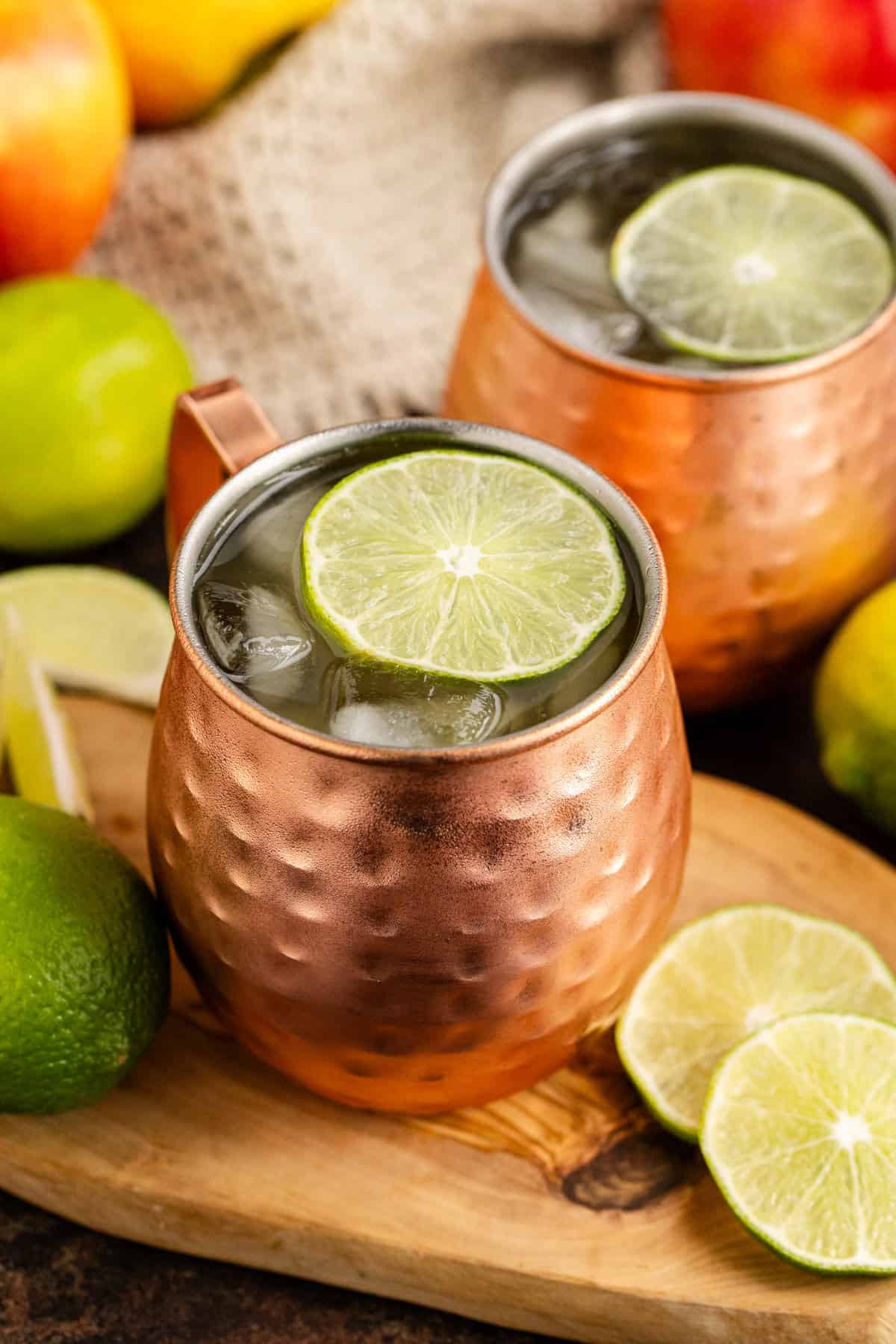 Apple Cider Moscow Mule in Glasses on a Board