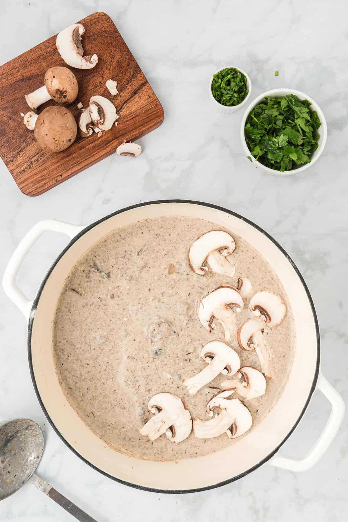 Mushroom Soup Without Cream in a Pot with Mushrooms on Top