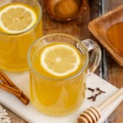 Old Fashioned Hot Toddy in Mug with a Lemon Round