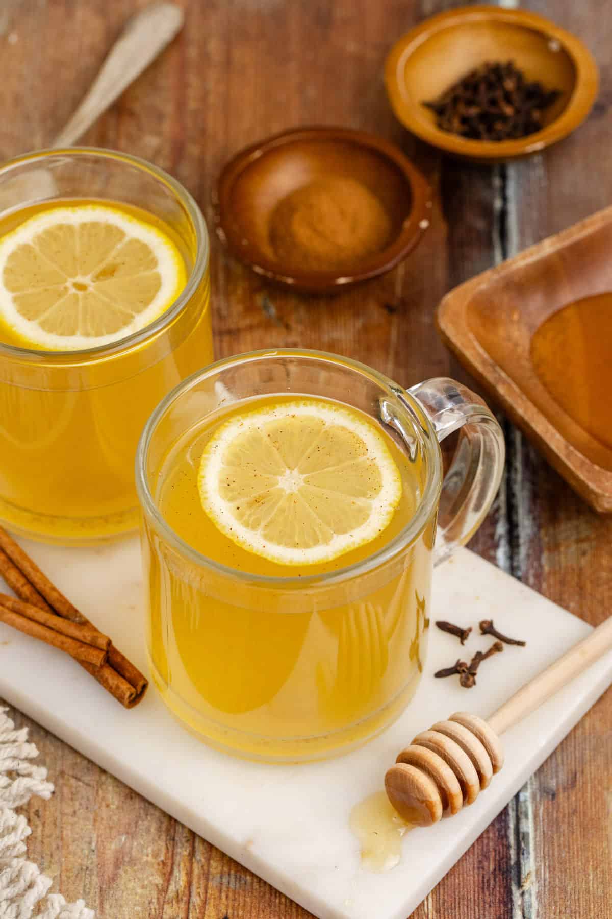 Old Fashioned Hot Toddy in Mug with a Lemon Round