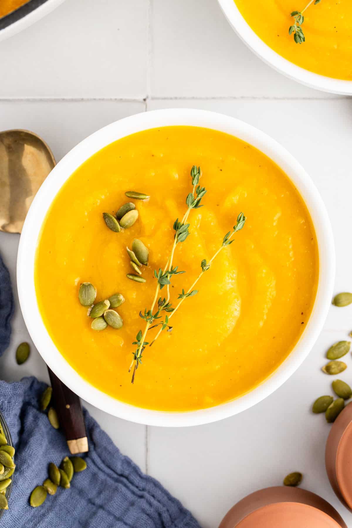 Roasted Butternut Squash and Garlic Soup Garnished in a Bowl