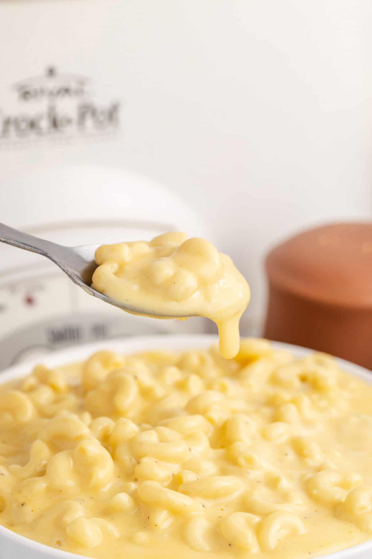 Slow Cooker Mac and Cheese Velveeta on a Spoon