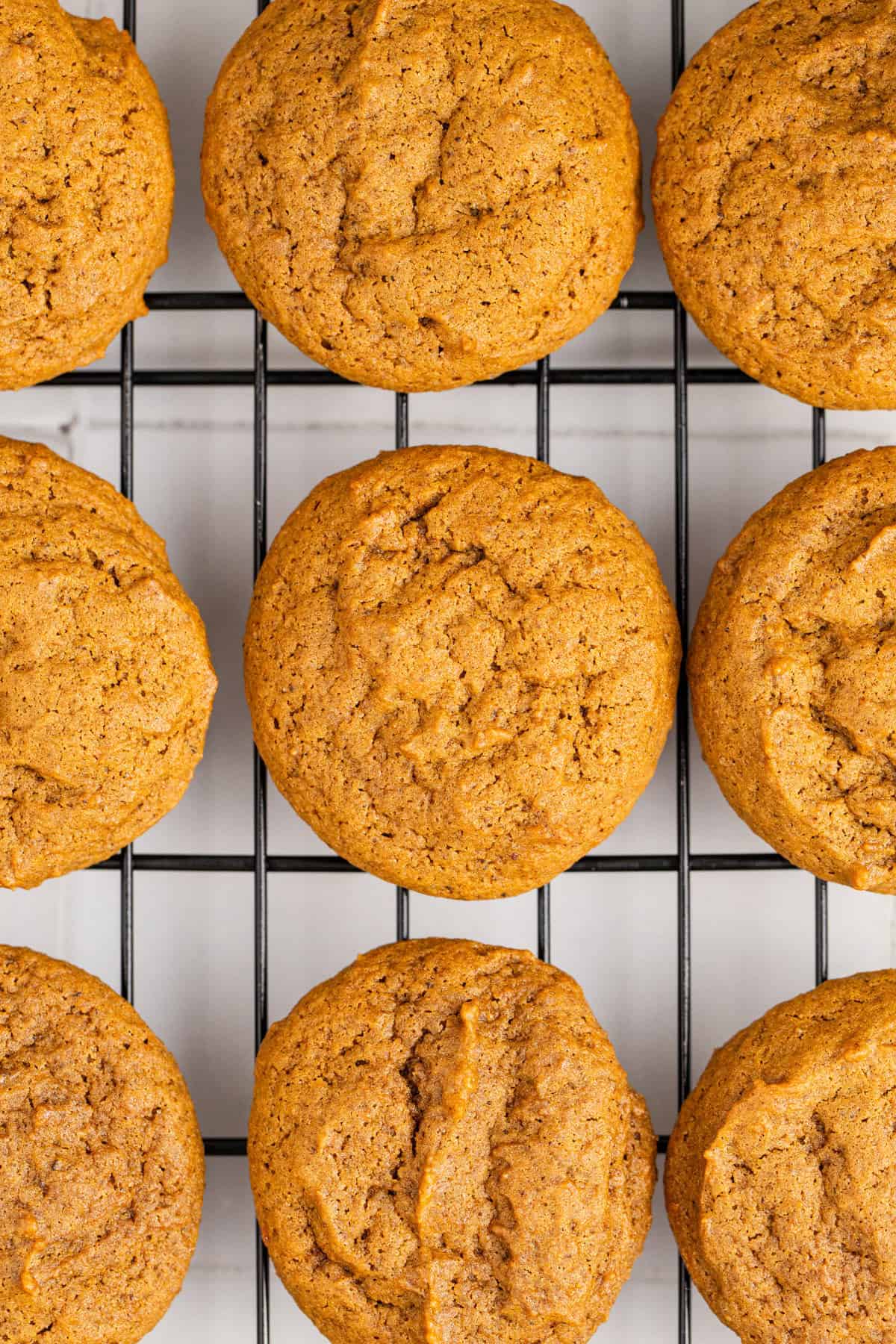 Spicy Chewy Ginger Molasses Cookies on a Cooling Rack