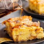 Eggnog French Toast Bake Recipe Slice Syrup Pouring On Top