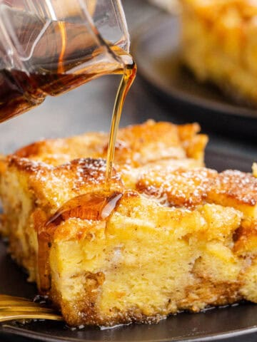 Eggnog French Toast Bake Recipe Slice Syrup Pouring On Top