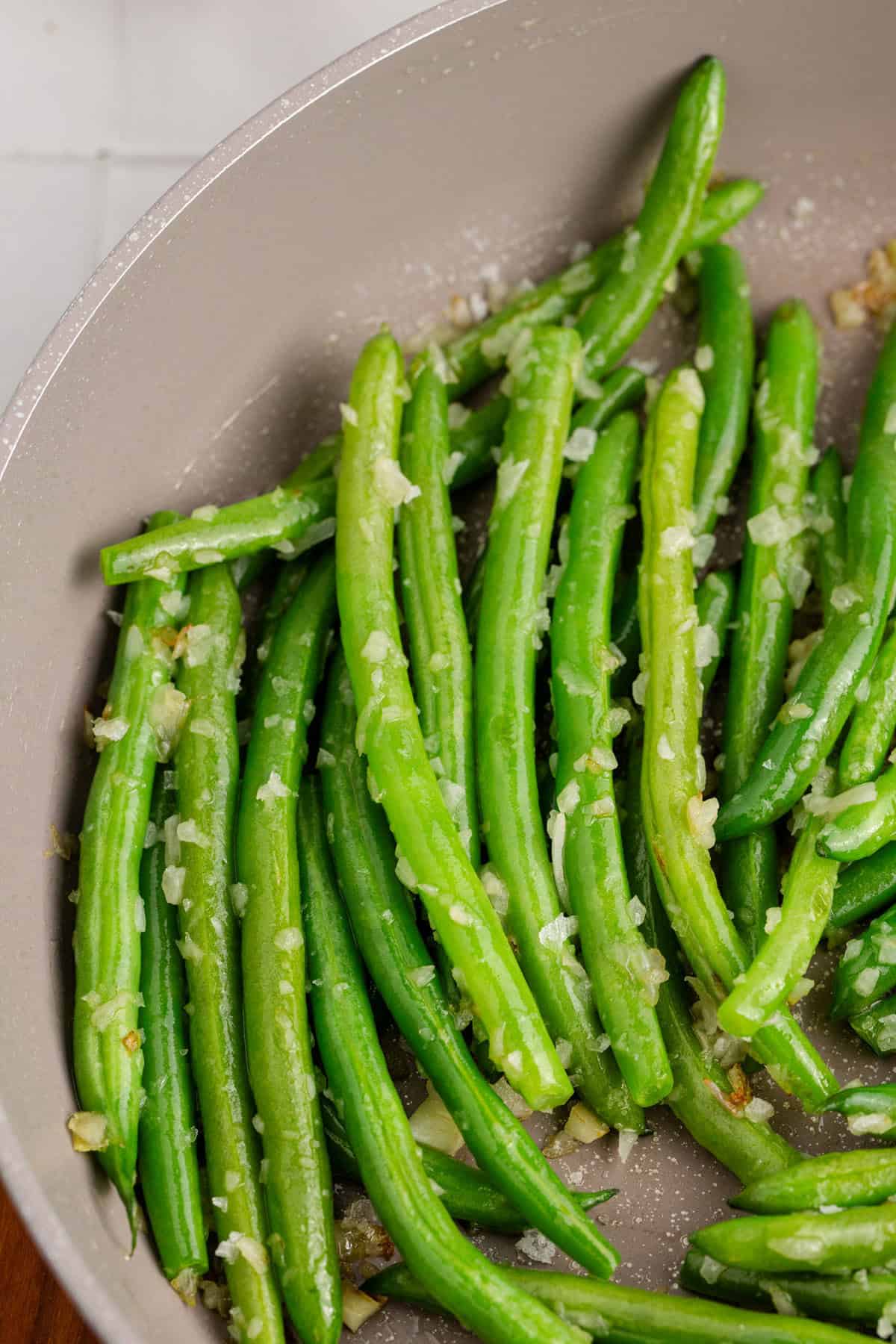 Sautéed Green Beans with Shallots Cooked in a Pan