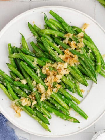 Sautéed Green Beans with Shallots and Garlic on a Platter