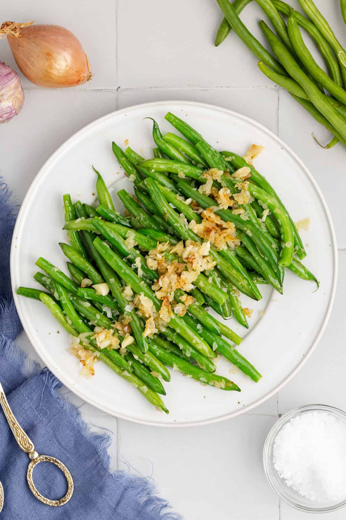 Sautéed Green Beans with Shallots and Garlic on a Platter