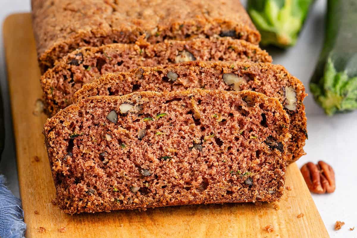 Gluten Free Zucchini Bread on a Cutting Board Sliced up