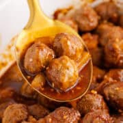 Sweet and Sour Meatballs Crockpot on a Serving Spoon