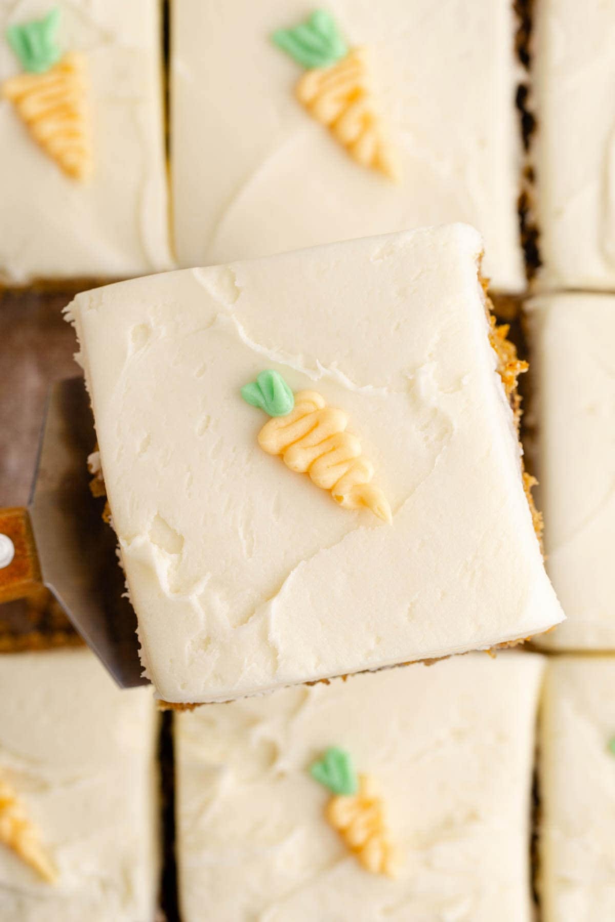 Carrot Sheet Cake Closeup of a piece being taken