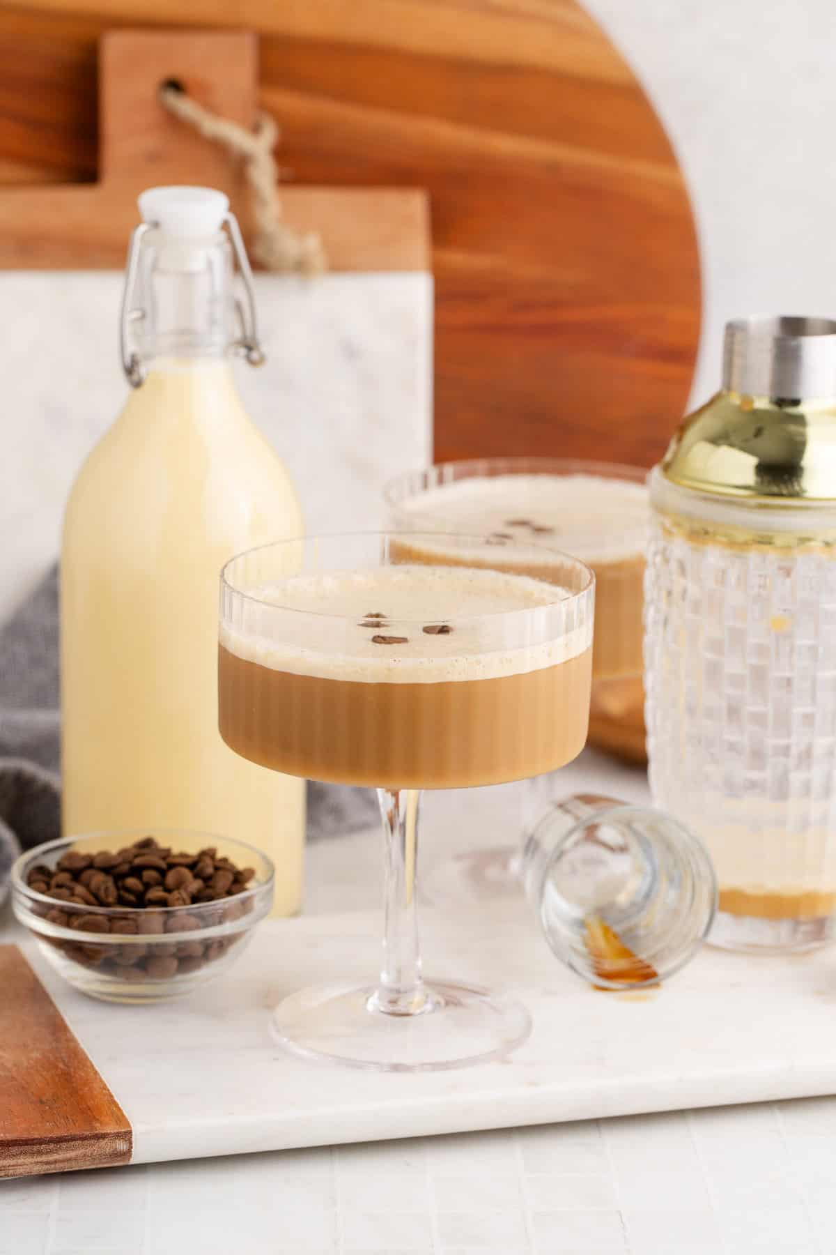 Eggnog Espresso Martini in a Coupe Glass with Coffee Beans