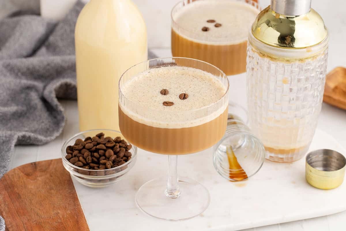 Eggnog Espresso Martini in a Coupe Glass with Coffee Beans
