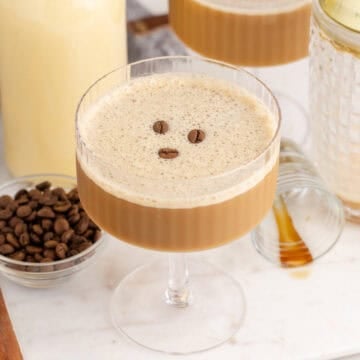 Eggnog Espresso Martini in a Coupe Glass with Coffee Beans