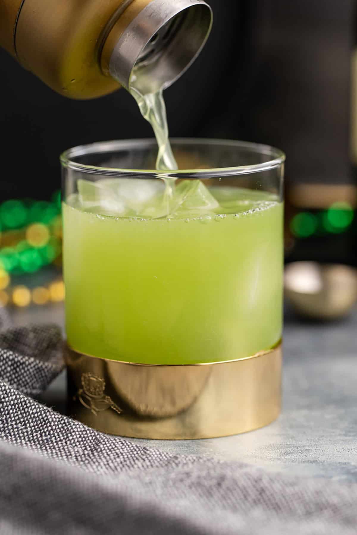 Shamrock Sour bring Poured into a Lowball Glass