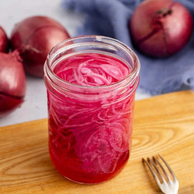 Pickled Onions Apple Cider Vinegar after set and ready to eat in a mason jar