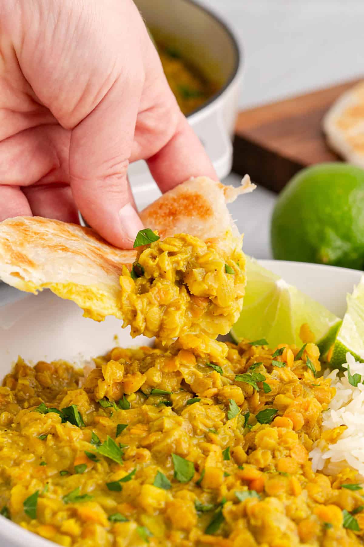 Coconut Milk Curry Lentils scooped on naan