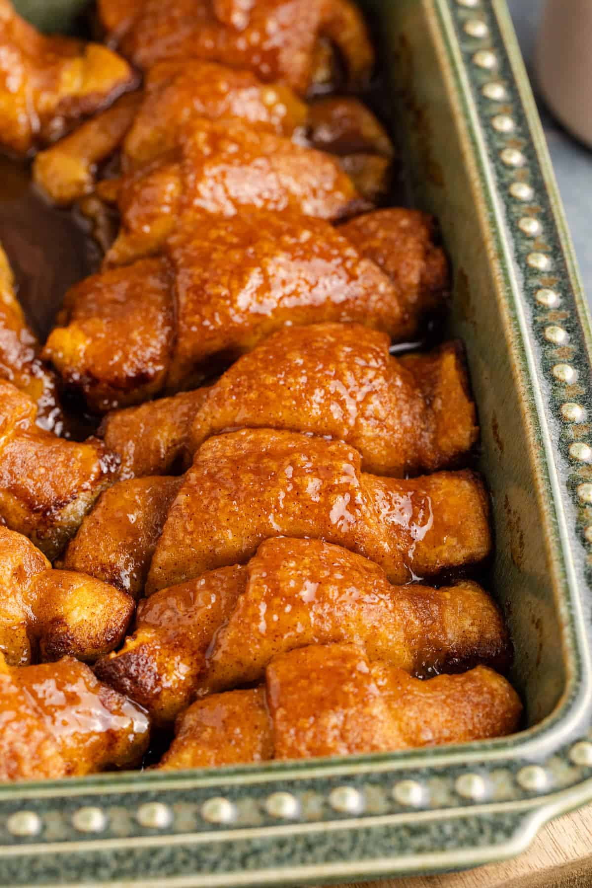 Apple Dumplings using Crescent Rolls in a casserole dish