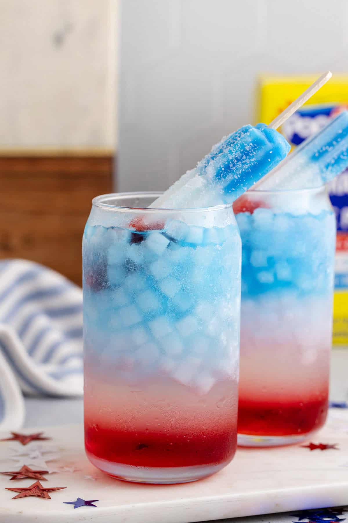 Bomb Pop Cocktail with popsicles as garnish