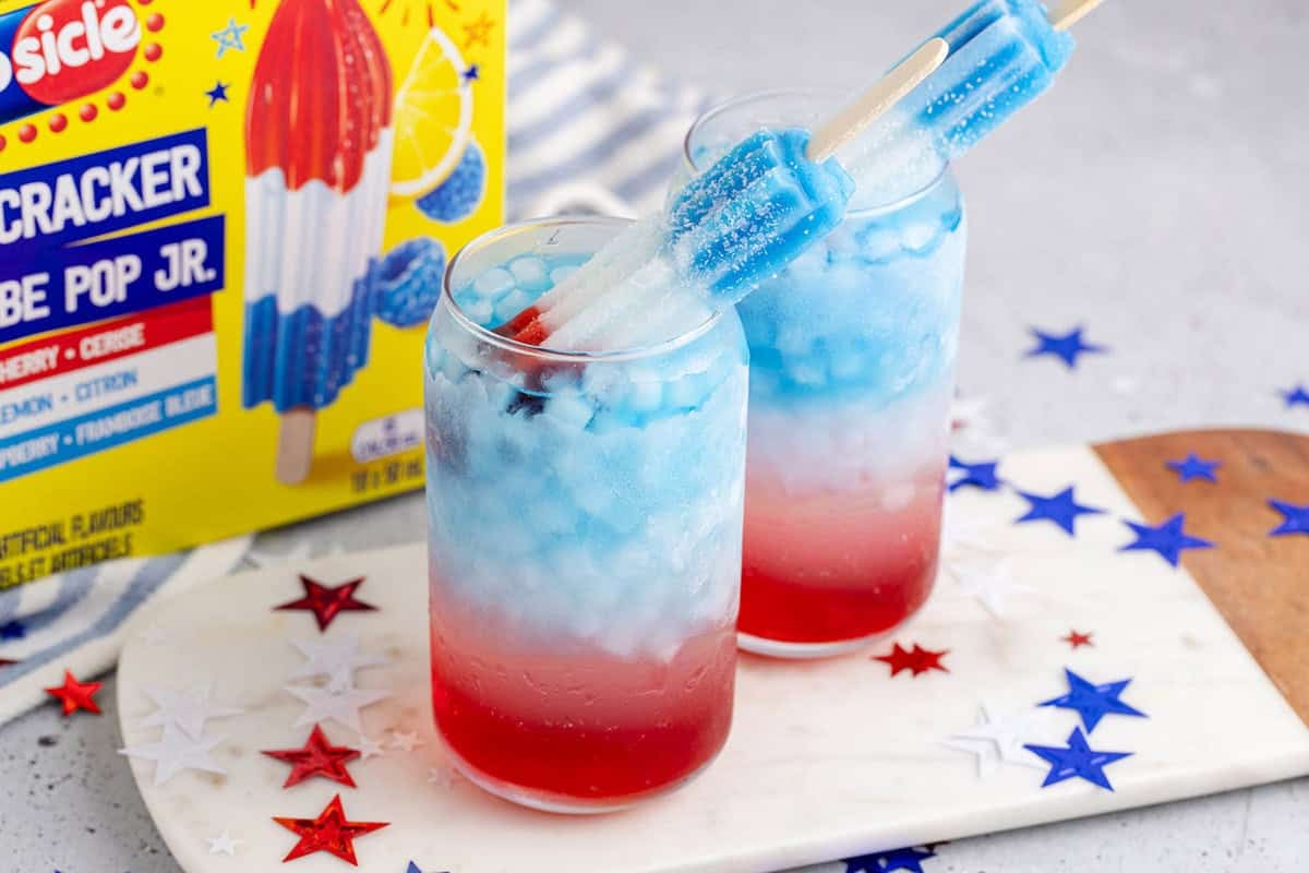 Bomb Pop Cocktail in Glasses with stars around