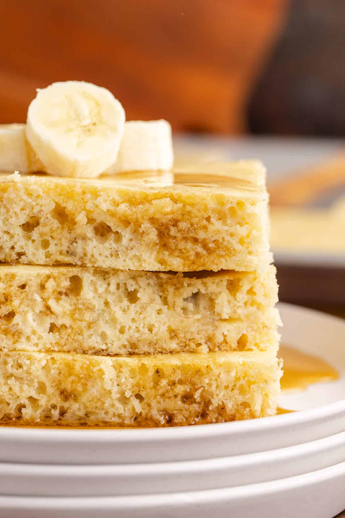 Sheet Pan Banana Pancakes Close up stacked on a plate