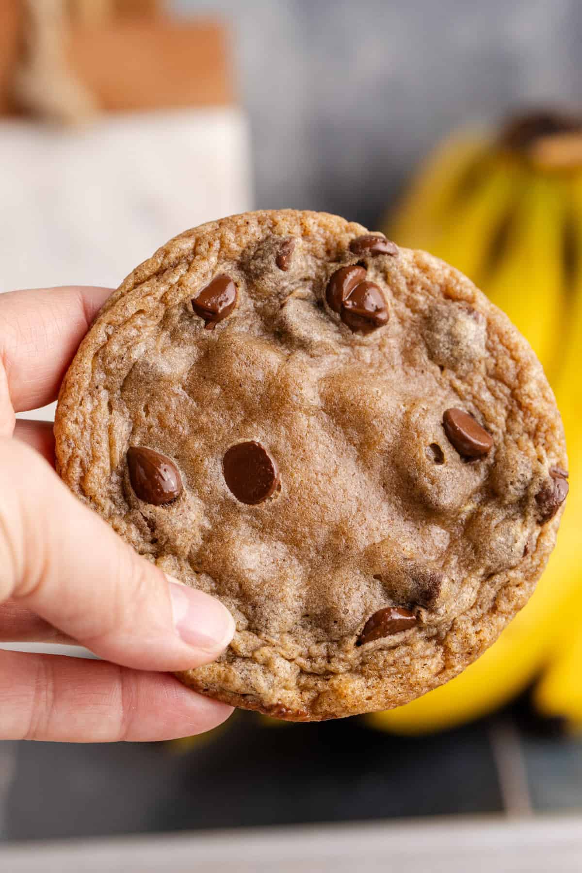 Banana Chocolate Chip Cookie held up close