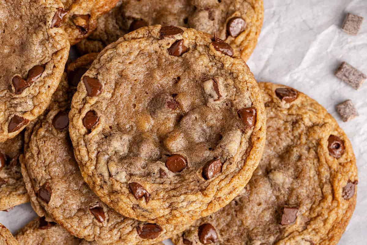 Banana Chocolate Chip Cookies piled on parchment paper