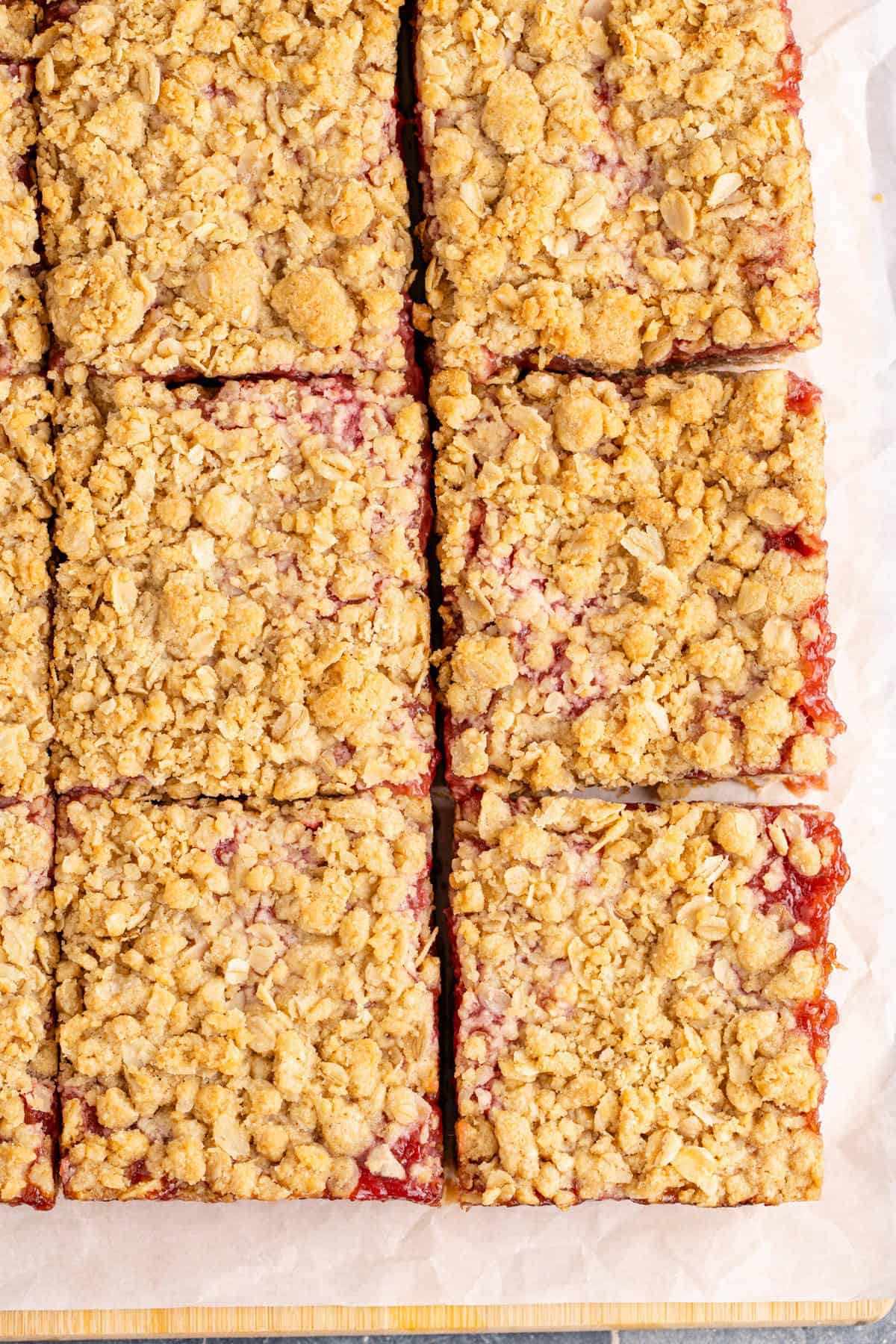 Strawberry Rhubarb Bars with Crumble Topping Cut in Squares