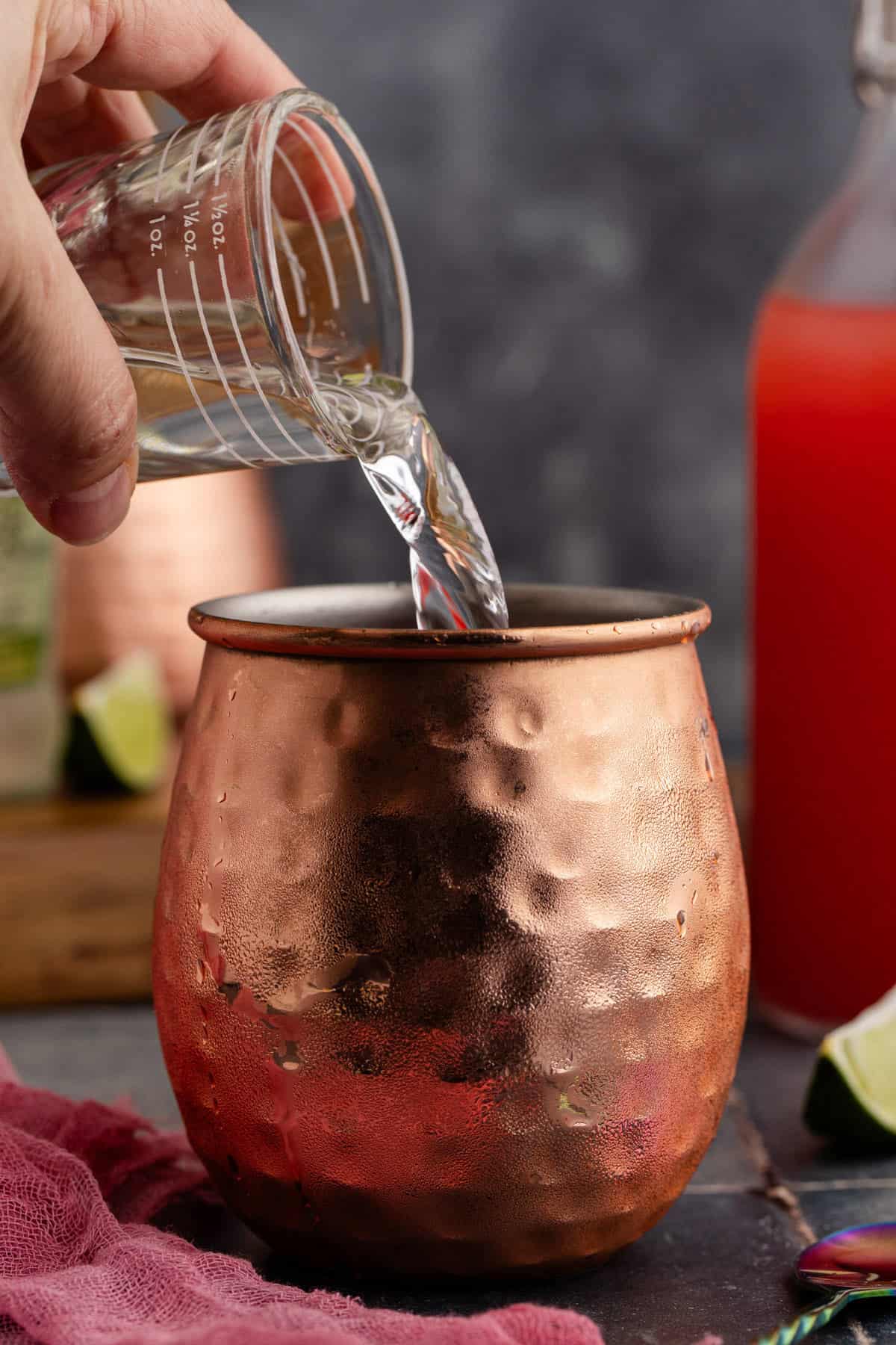 Watermelon Moscow Mule being made in a copper glass