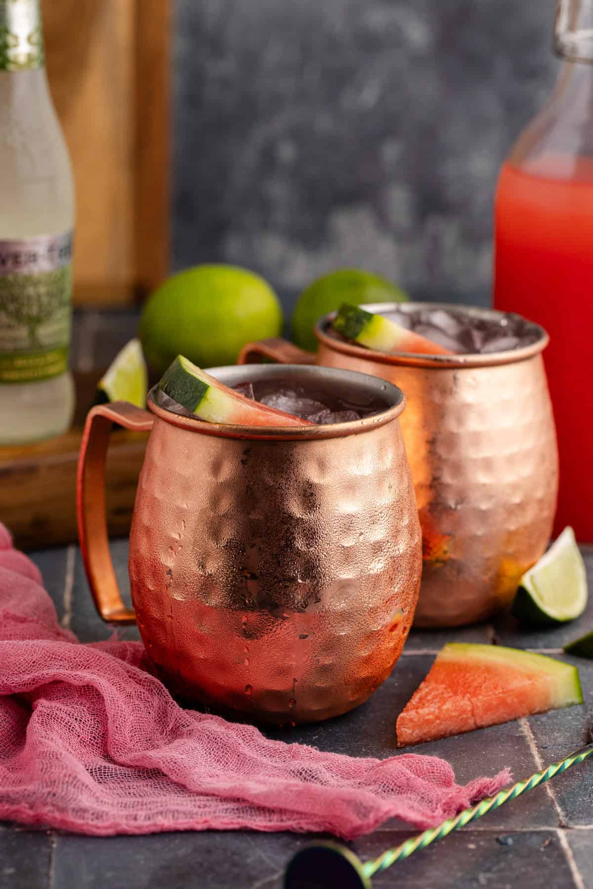 Watermelon Moscow Mule in Mule glasses with watermelon garnish
