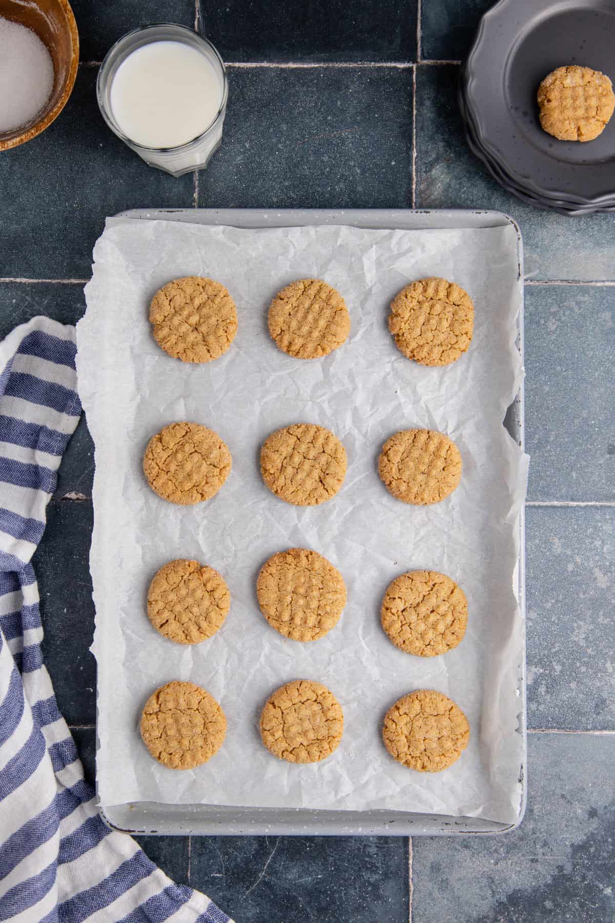 4-Ingredient Peanut Butter Cookies on Parchment Lined Baking Sheet