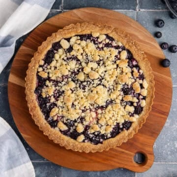Blueberry Tart made on a cutting board
