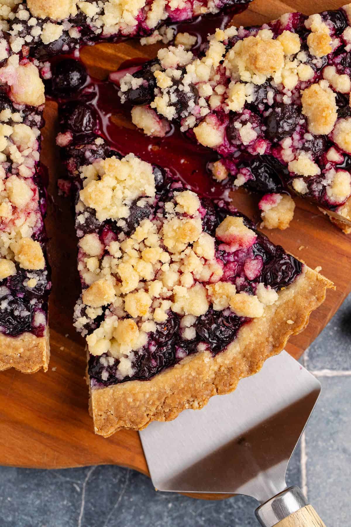 Blueberry Tart slice being taken