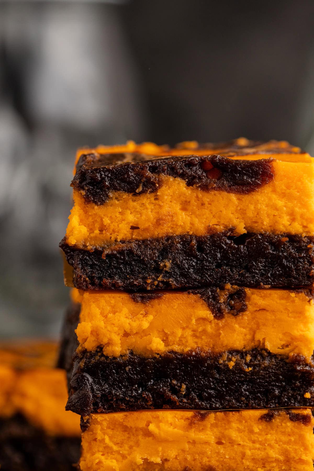 Halloween Brownies with Orange Cheesecake Layer Stacked