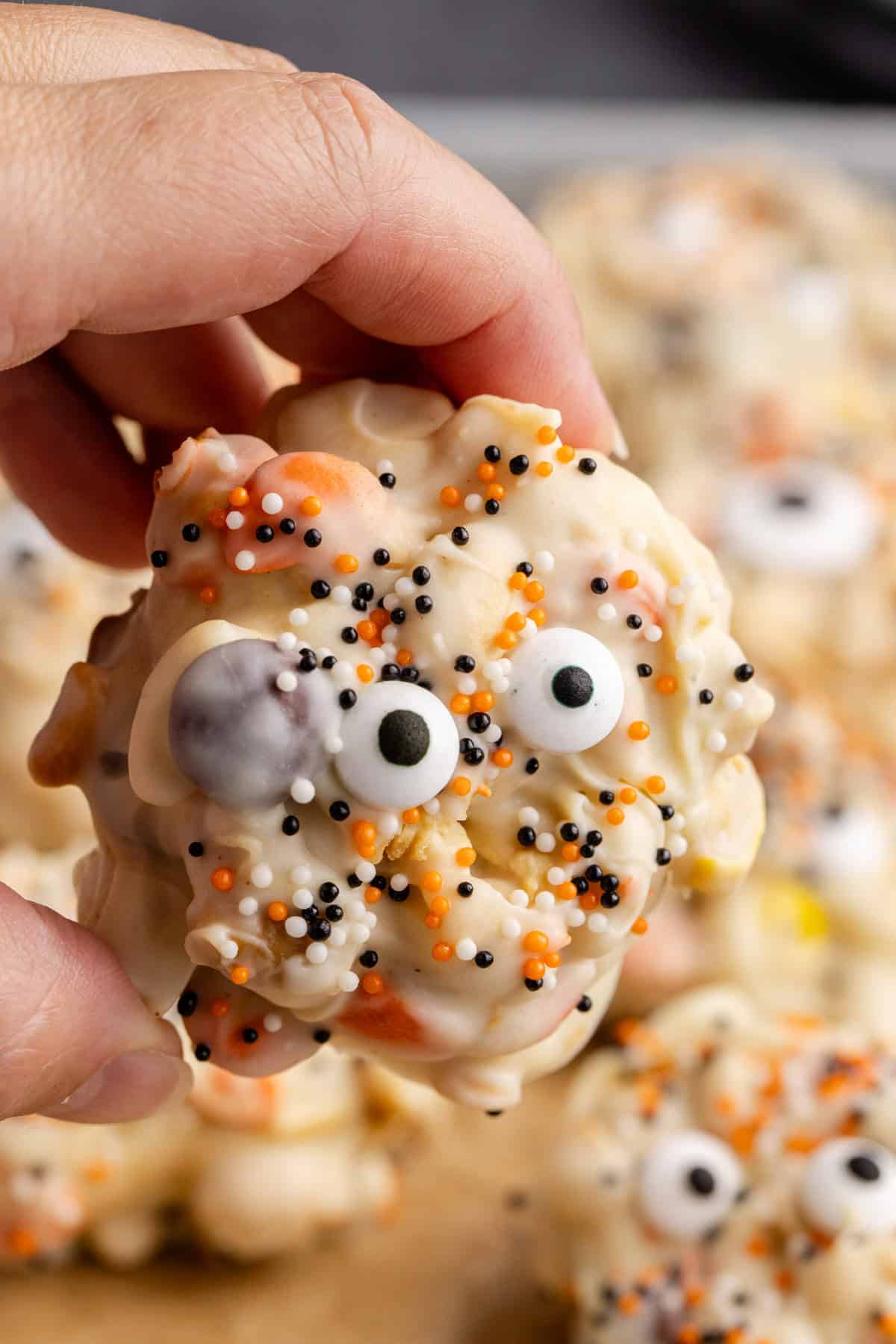 White Chocolate Peanut Halloween Crockpot Candy with Halloween Sprinkles and Edible Eyeballs