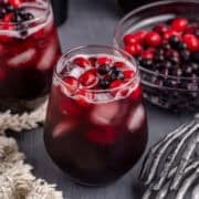 Halloween Sangria with cranberries and blueberries on top