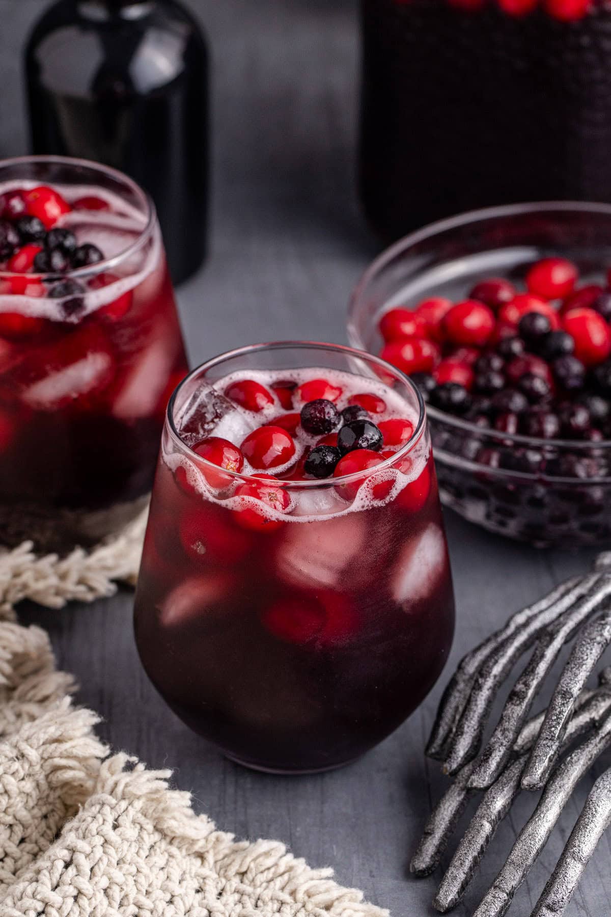 Halloween Sangria in glasses with berries on top