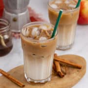 Iced Apple Crisp Oat Milk Macchiato Served Over Ice with a Straw