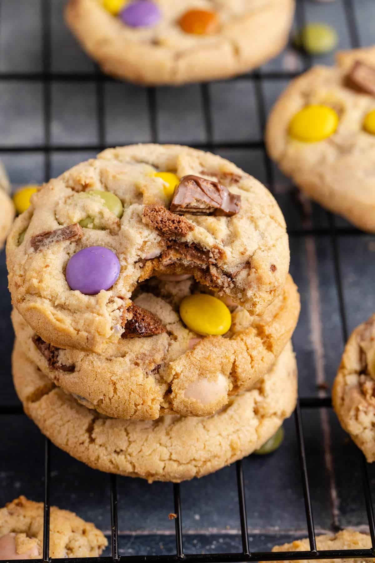 Leftover Halloween Candy Cookies Bitten and Stacked on Wire Rack